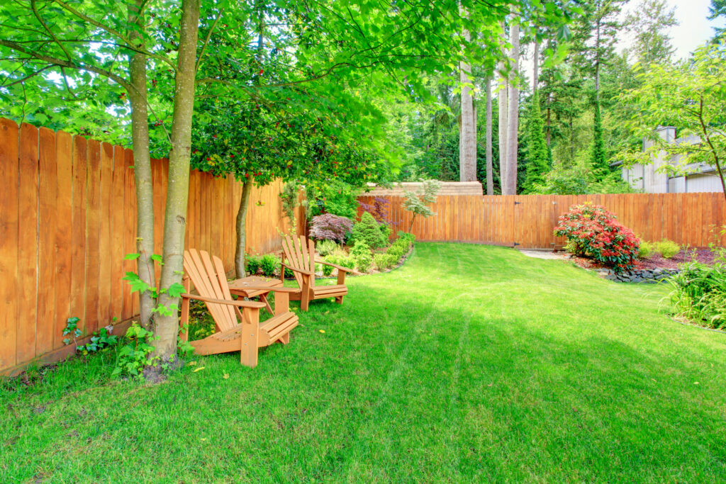 fence staining cost for a backyard fence
