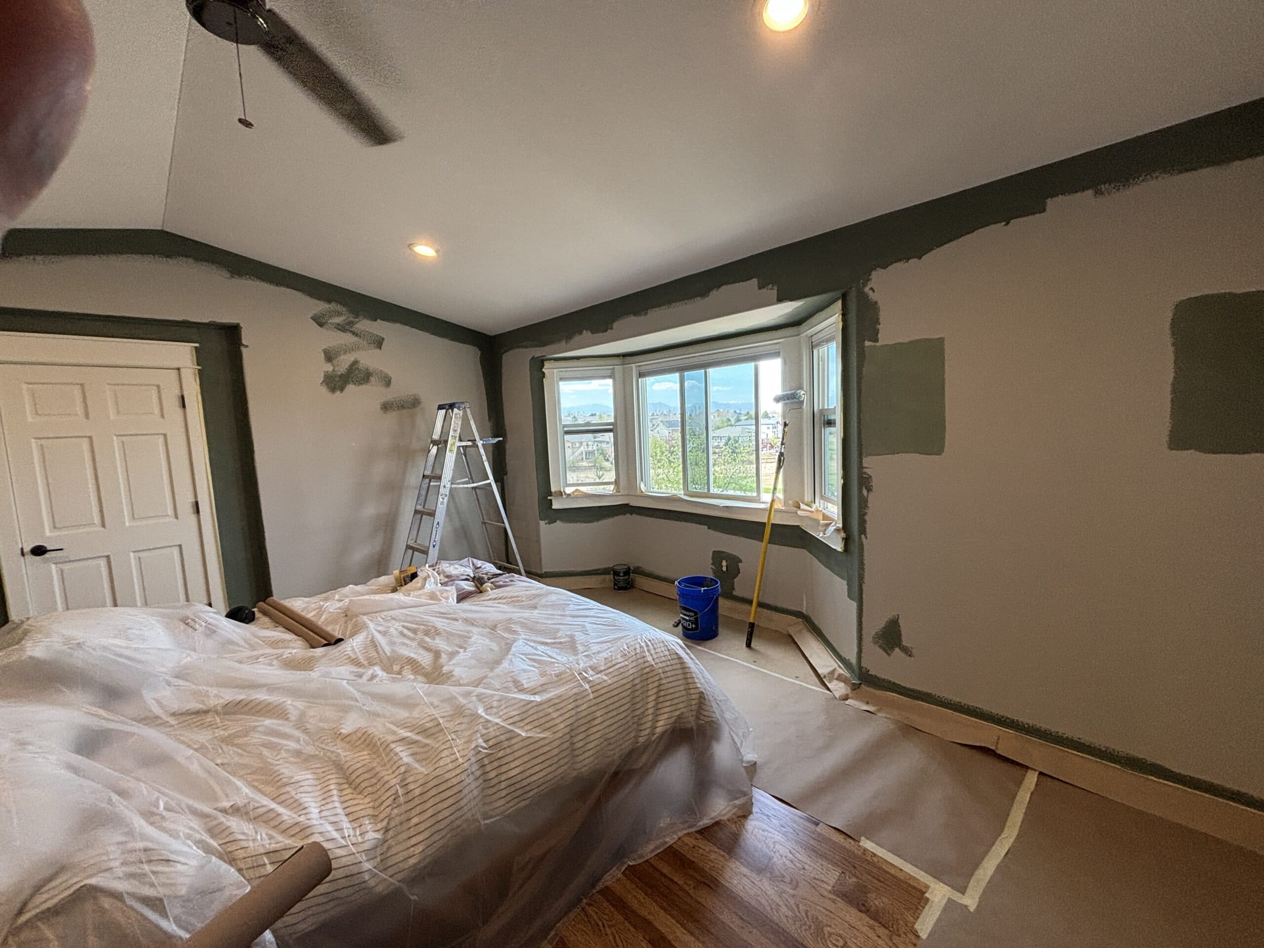 Master Bedroom Interior Painting Painted residential living room with slate tile fireplace